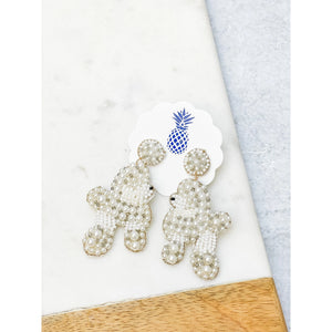 Oy with the poodles already - beaded earrings